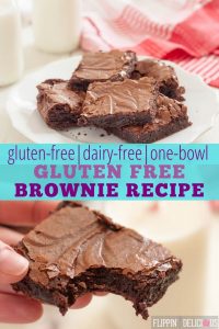 gluten free brownies on a white plate, with a hand holding one gluten free brownie with a bite taken out
