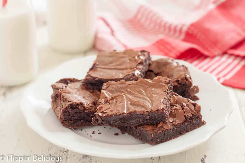 The best gluten free fudgy brownie recipe I have ever made! Rich and fudgy made with cocoa powder, they have the perfect flaky top.