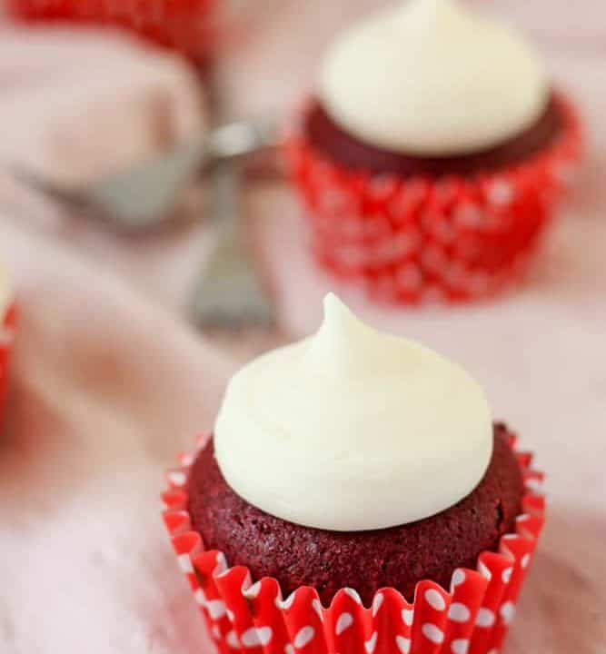 This is the best gluten free red velvet cupcake recipe ever. Moist cupcakes with a hint of chocolate and vanilla. And that cream cheese frosting on top... You should make it!