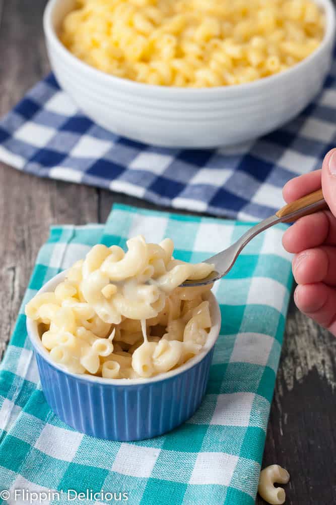 This DAIRY FREE gluten free one pot no drain mac n cheese is ready, start to finish, in 15 minutes. Easier than the box, and WAY better! This recipe will change your life!