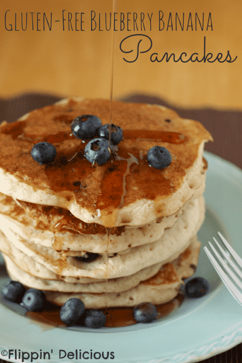 Sweet banana pancakes bursting with fresh blueberries. Best gluten-free breakfast around!