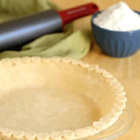 Truly the best all-butter flaky gluten free pie crust recipe! So tender and flaky, yet it holds up enough you can pick up a piece of pie with your hand.