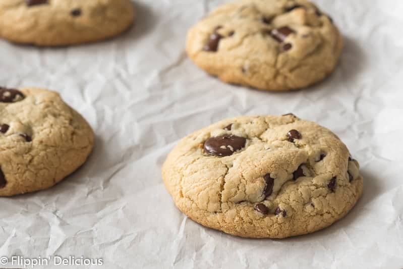 Giant gluten free chocolate chip cookies don't get any better than this! My favorite go-to soft baked, bakery-style gluten free chocolate chip cookie recipe. Easily made dairy free.