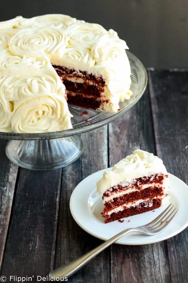 Step-by-step photos make stacking three layers of gluten free red velvet cake piped w/ fluffy rosettes a 