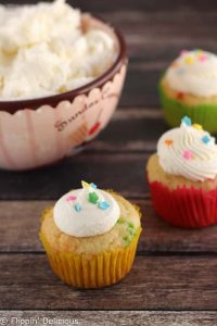 This Easy Homemade American Buttercream Frosting recipe will quickly become one of your favorites! Just 4 ingredients and it is so creamy and fluffy! Naturally gluten-free.