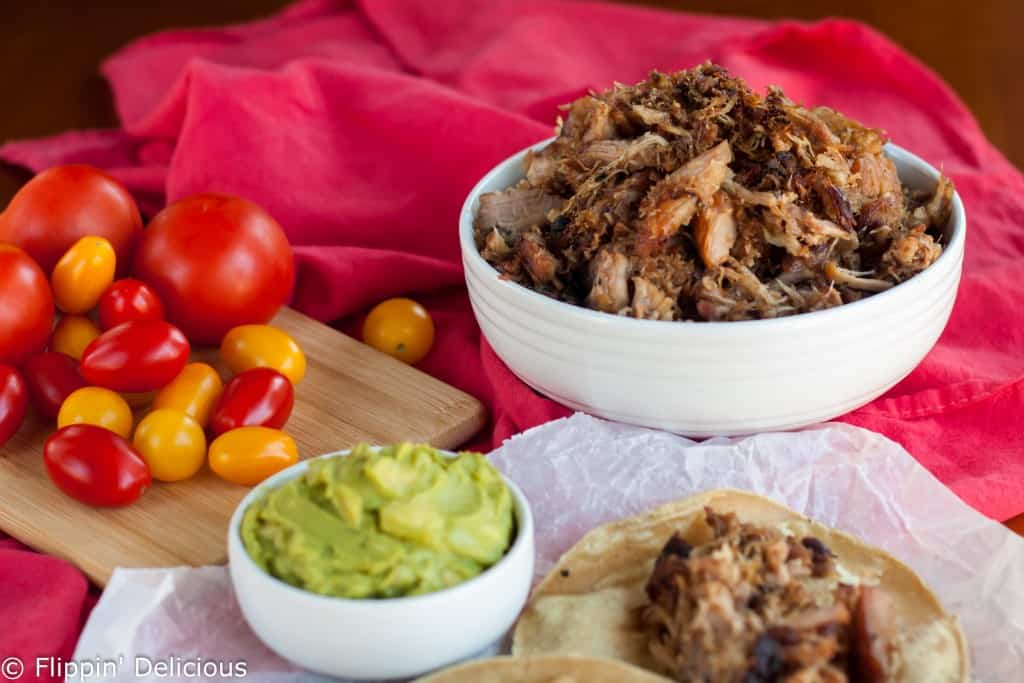 Nothing is easier than throwing these easy crispy carnitas in the slow cooker at lunch, and then enjoying them for dinner with some gluten free corn tortillas.