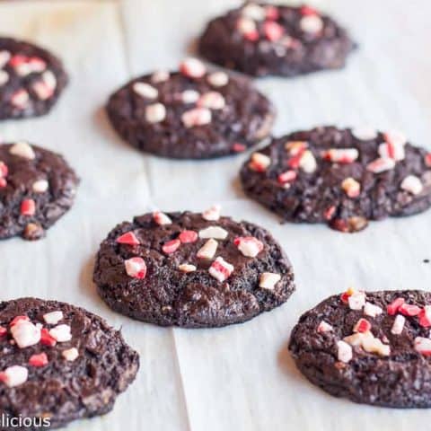 Flourless Chocolate Peppermint Cookies are easy, festive, and naturally gluten free. Just 7 ingredients in these flourless chocolate peppermint cookies!