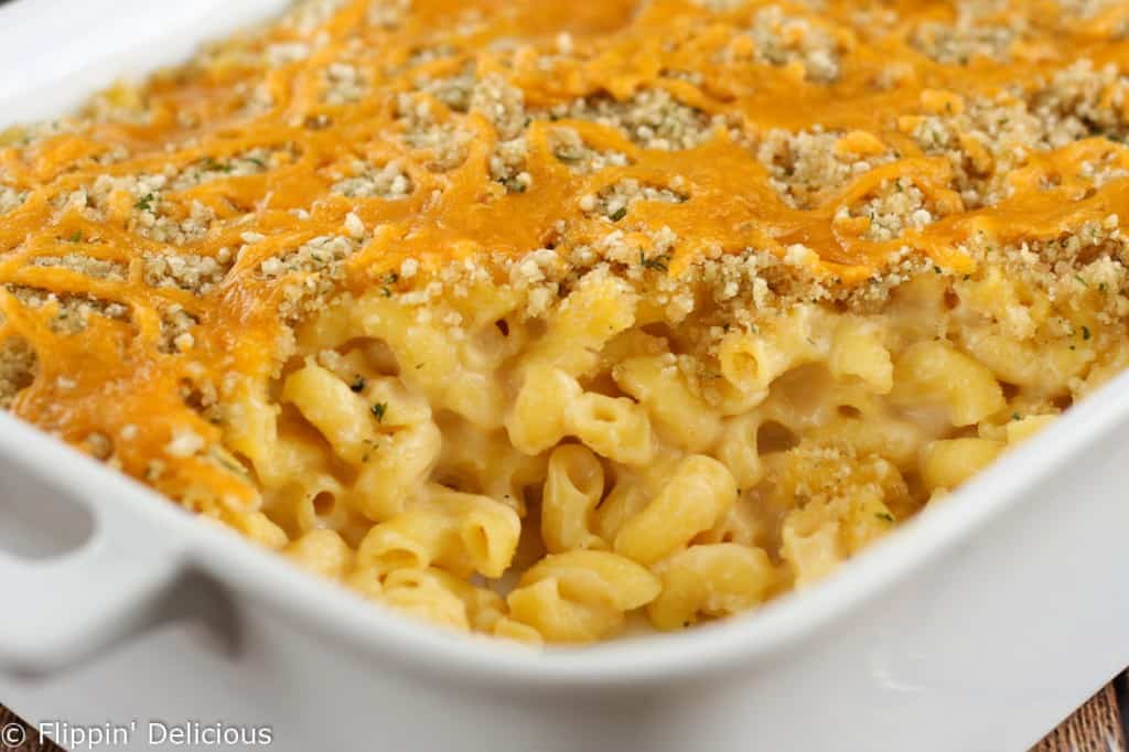 Gluten free mac and cheese is creamy and topped with buttery breadcrumbs. Nothing says comfort food like mac and cheese!