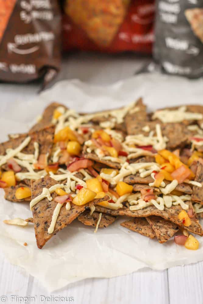 Easy Vegan Nachos with Chipotle Mango Salsa. Sweet with a hint of heat and the salsa has just 3 ingredients!