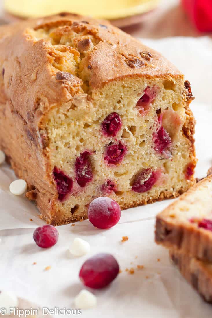 Moist gluten free cranberry bread with orange, white chocolate, and hazelnuts is the ultimate holiday quick bread! Dairy free option. 