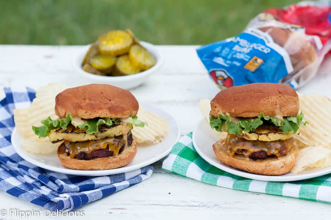 Gluten free teriyaki grilled pineapple burgers are the perfect twist for your next summer barbecue! Juicy beef hamburger patties rubbed with ginger-brown sugar rub, fresh grilled pineapple slices, and a creamy teriyaki mayo will make your mouth water!