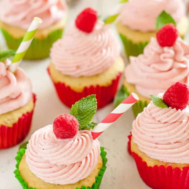 These gluten free raspberry lime mojito cupcakes are tender and sweet. Each bite will whisk you away to your favorite summer patio with a cold mojito in hand!