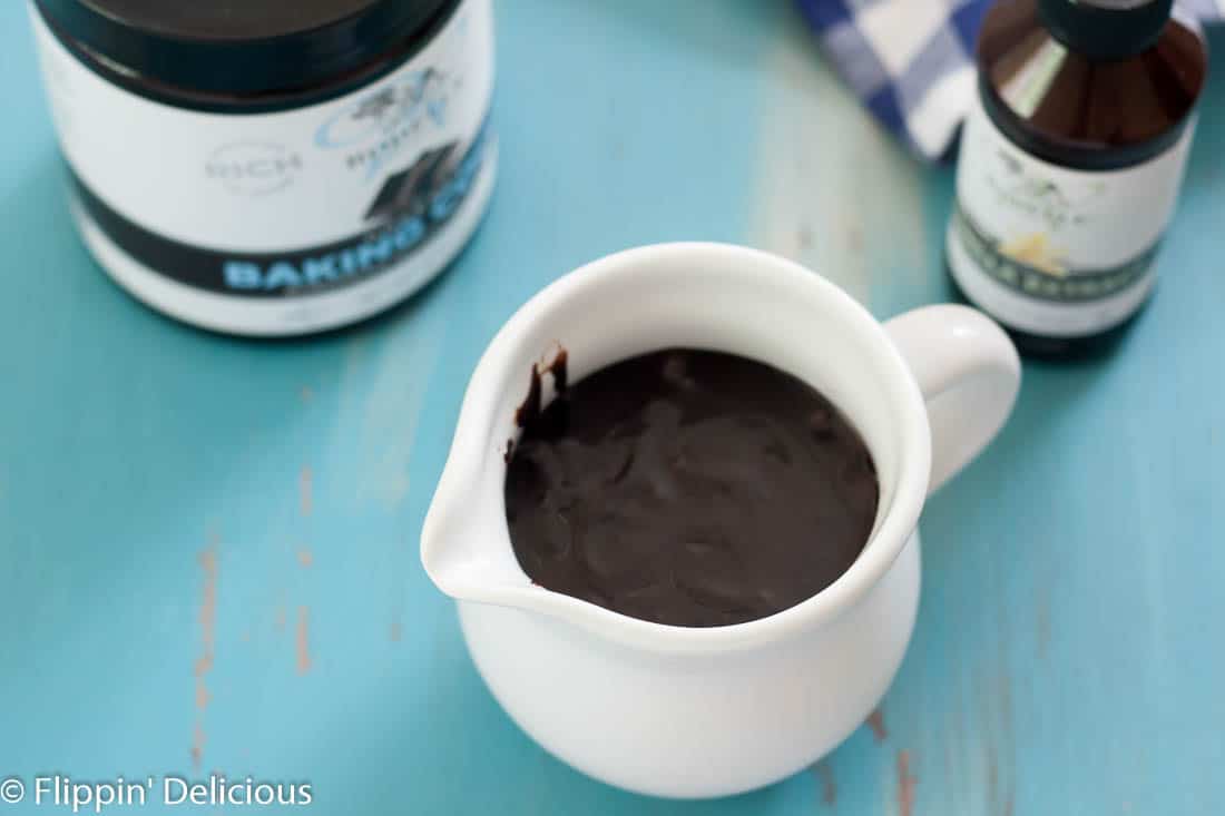 Dairy Free Hot Fudge Sauce that is thick, smooth. Made with cocoa powder and coconut milk, you'd never guess it is vegan!