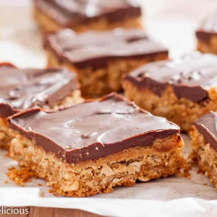 Chewy Gluten Free Peanut Butter Bars with chocolate ganache (dairy free) are the perfect afternoon treat! Also known as lunch lady peanut butter bars, I love the extra layer of peanut butter frosting!