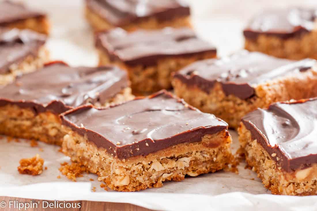 Chewy Gluten Free Peanut Butter Bars with chocolate ganache (dairy free) are the perfect afternoon treat! Also known as lunch lady peanut butter bars, I love the extra layer of peanut butter frosting!