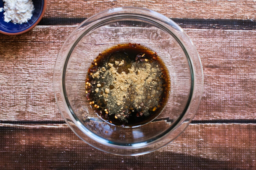 gluten free teriyaki sauce and teriyaki marinade ingredients in a small bowl before mixing