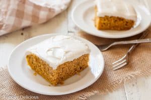 Moist Gluten Free Pumpkin Cake with cream cheese frosting is the ultimate easy fall dessert! Dairy free option.