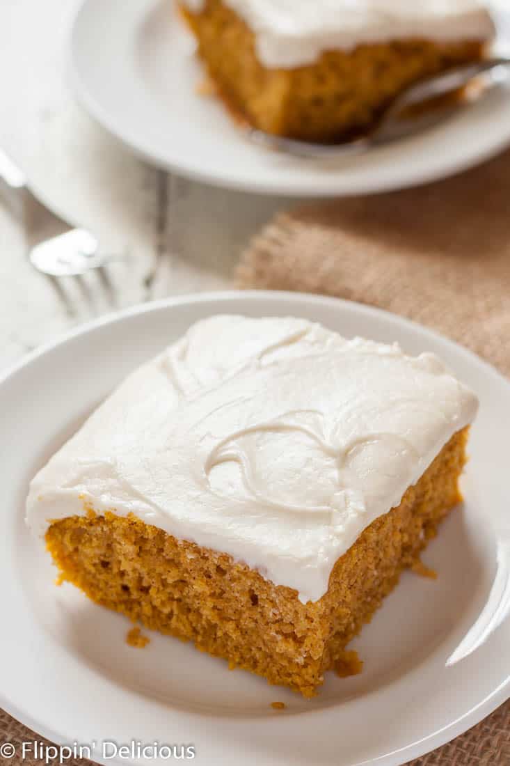 Moist Gluten Free Pumpkin Cake with cream cheese frosting is the ultimate easy fall dessert! Dairy free option.