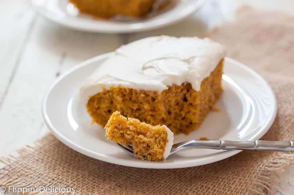 Moist Gluten Free Pumpkin Cake with cream cheese frosting is the ultimate easy fall dessert! Dairy free option.