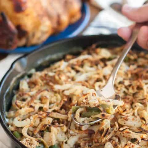 This gluten free vegan green bean casserole takes the classic comforting side and makes it accessible to nearly everyone! The homemade crispy onions make it really special.