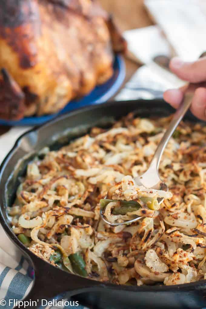 This gluten free vegan green bean casserole takes the classic comforting side and makes it accessible to nearly everyone! The homemade crispy onions make it really special. 