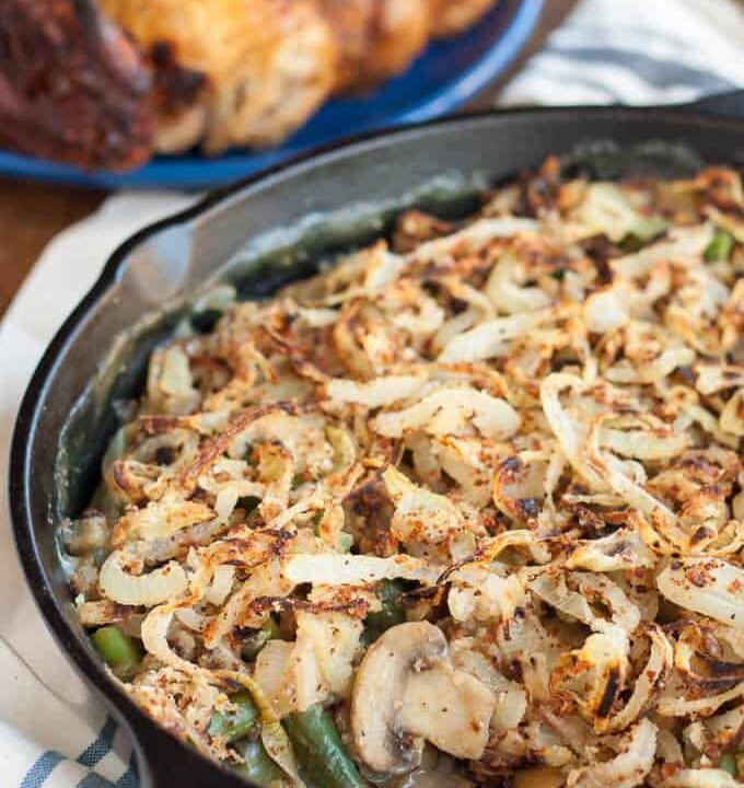 This gluten free vegan green bean casserole takes the classic comforting side and makes it accessible to nearly everyone! The homemade crispy onions make it really special.