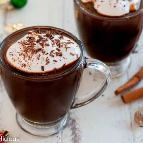 Indulgent Vegan Mexican Hot Chocolate, sweet and spicy hot chocolate topped with vegan whipped topping!