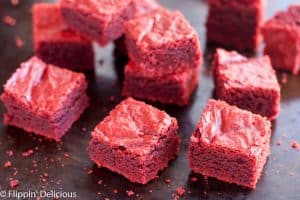 Gluten Free Red Velvet Brownies (dairy free, too) are chewy and fudgy with just a hint of cocoa and vanilla.