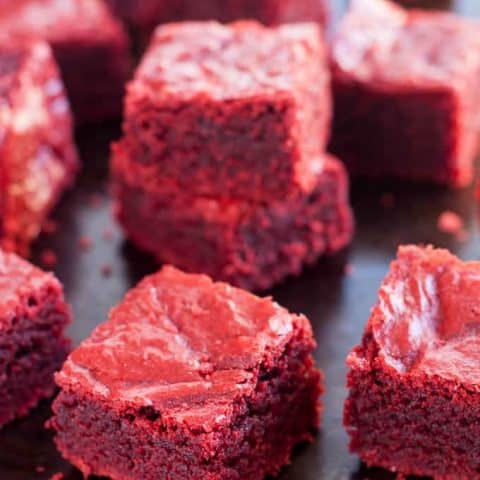 Gluten Free Red Velvet Brownies (dairy free, too) are chewy and fudgy with just a hint of cocoa and vanilla.