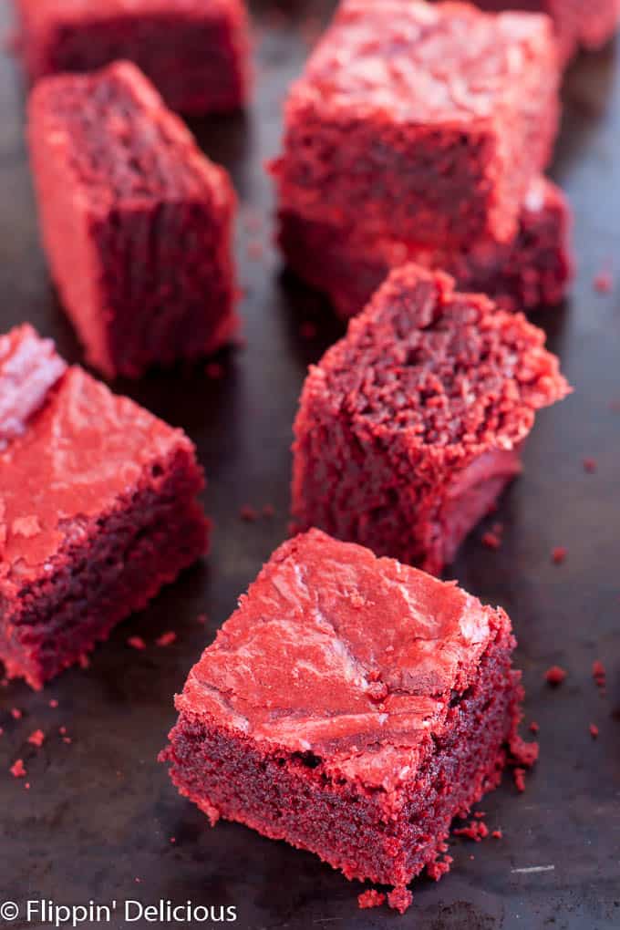 Gluten Free Red Velvet Brownies (dairy free, too) are chewy and fudgy with just a hint of cocoa and vanilla.