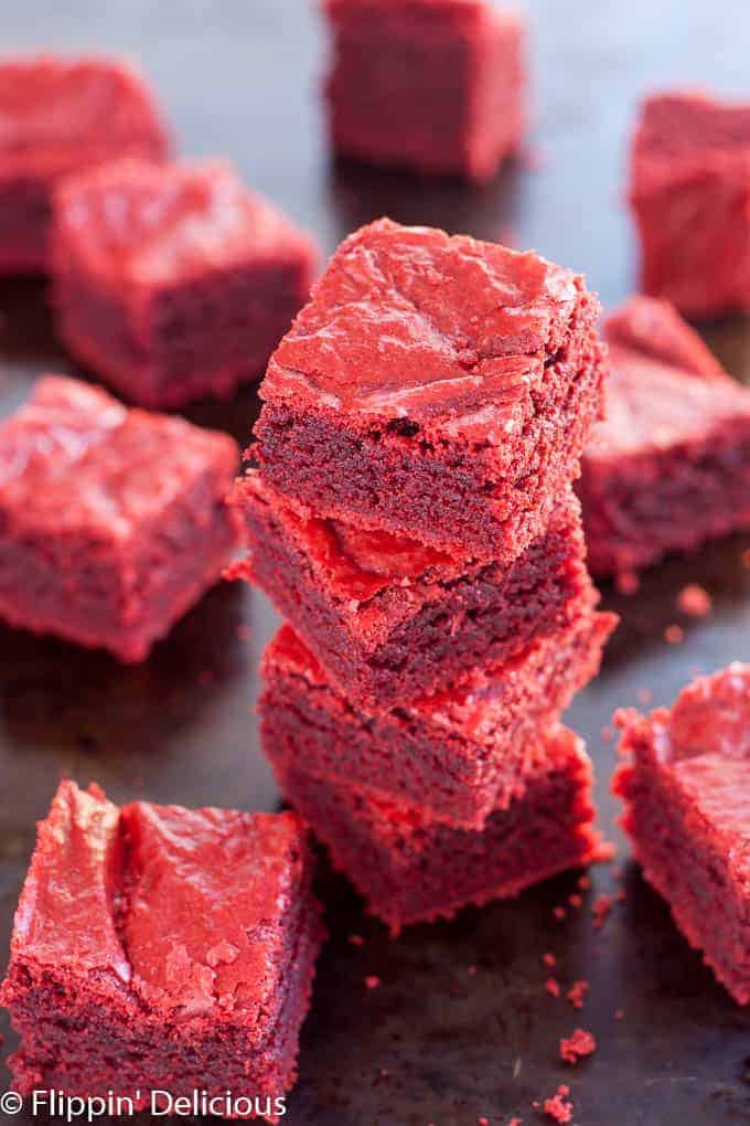 Gluten Free Red Velvet Brownies (dairy free, too) are chewy and fudgy with just a hint of cocoa and vanilla.