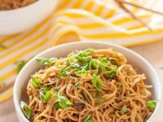 Gluten free sticky garlic noodles are so good that you&rsquo;ll be licking your bowl. Plus, they come together in just 15 minutes!