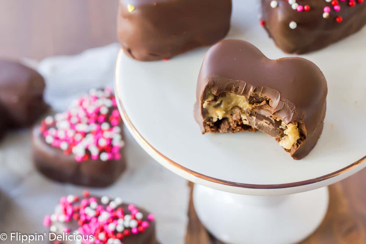 Gluten Free Cookie Dough Brownie Truffles are the perfect heart-shaped treat to give to your Valentine, or bring to your kid's class party.