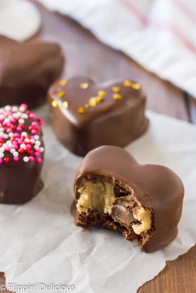 Gluten Free Cookie Dough Brownie Truffles are the perfect heart-shaped treat to give to your Valentine, or bring to your kid's class party.