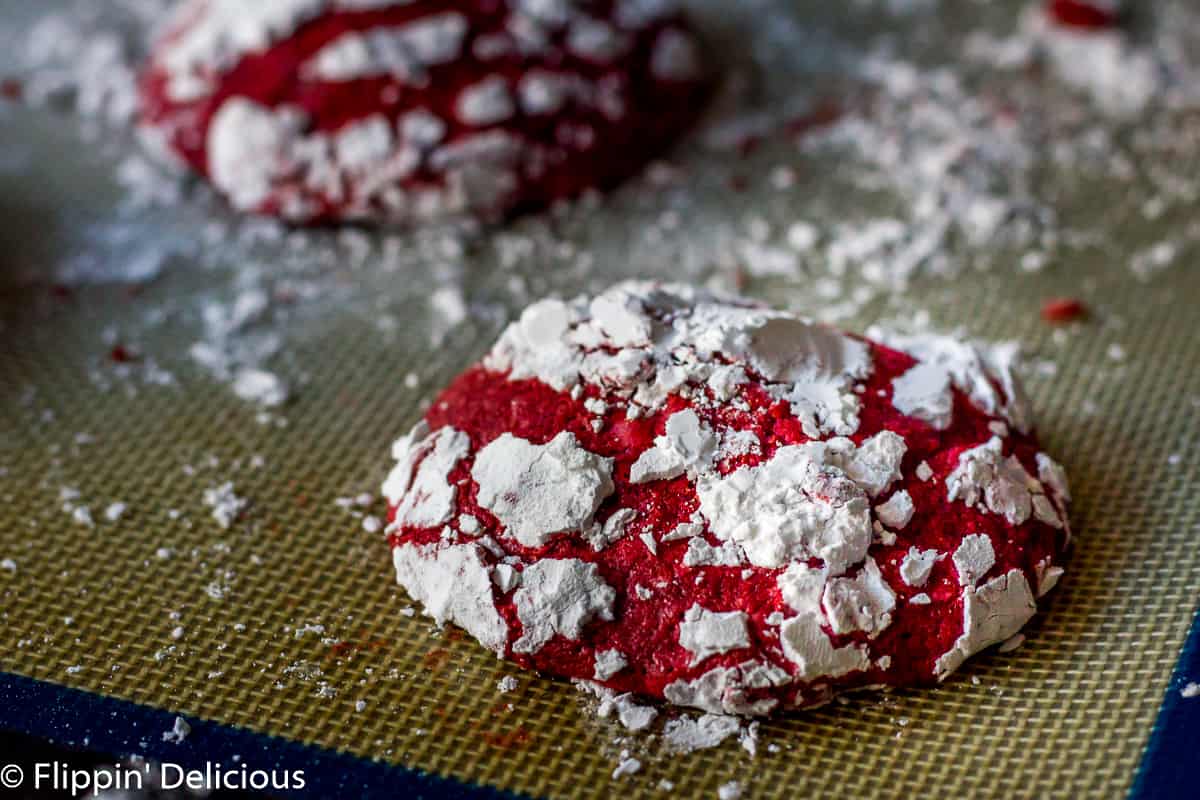 Gluten Free Red Velvet Crinkle Cookies are soft and cakey, with hints of real cocoa and vanilla. Covered in sweet powdered sugar, they make a fun and festive cookie.