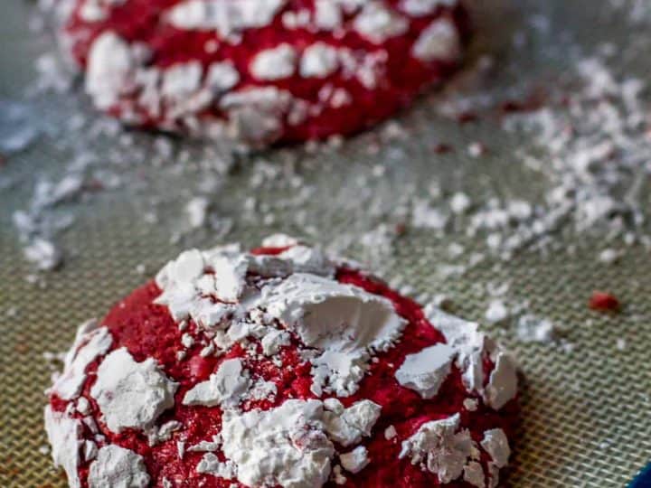 Gluten Free Red Velvet Crinkle Cookies are soft and cakey, with hints of real cocoa and vanilla. Covered in sweet powdered sugar, they make a fun and festive cookie.