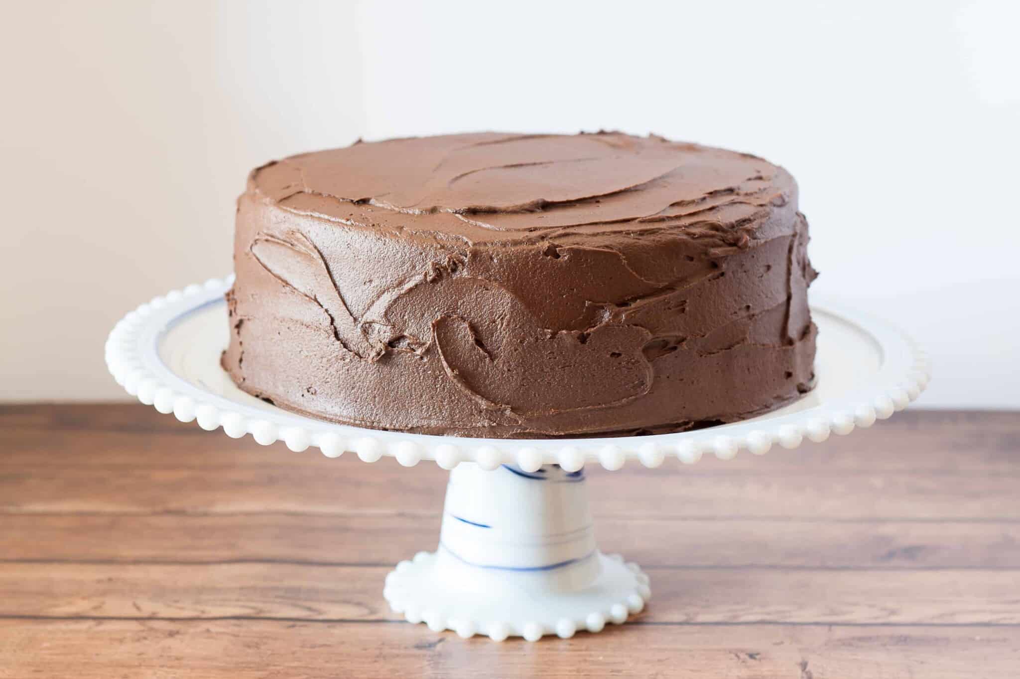 Gluten Free Yellow Cake with Chocolate Fudge Frosting has a moist and tender crumb with creamy chocolate fudge frosting. Vegan and Dairy Free options.