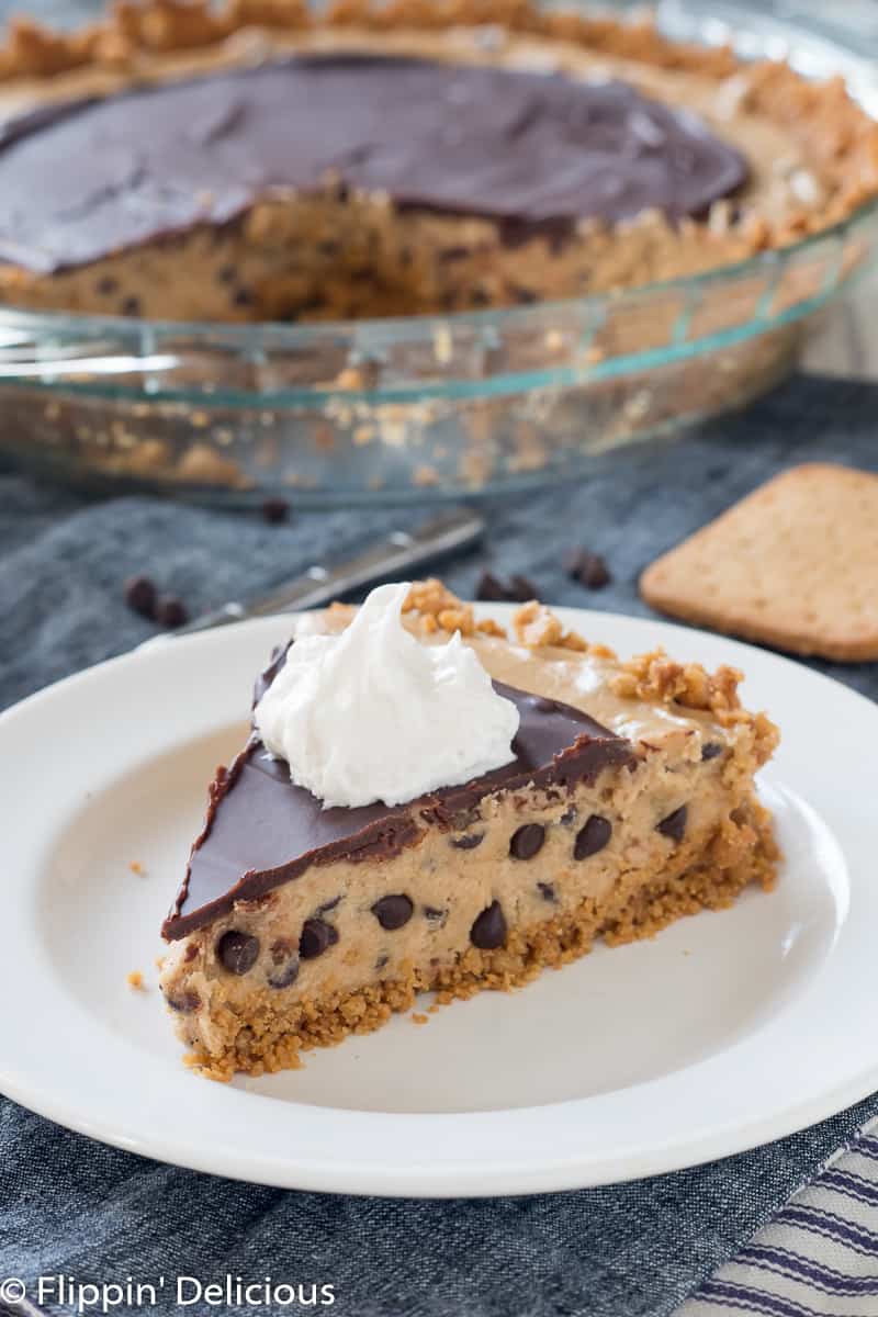 Gluten Free Cookie Dough Pie (dairy free too) with a crisp graham cracker-style crust filled with gluten free edible cookie dough and topped with chocolate.