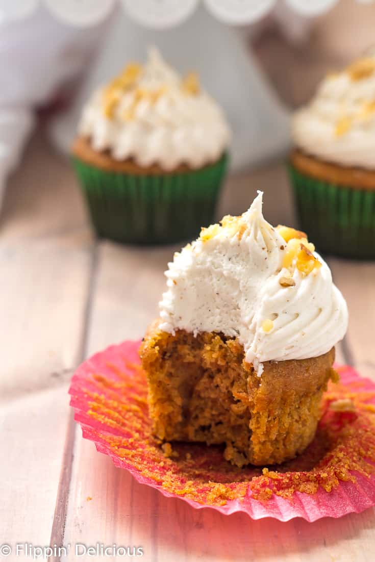 Gluten Free Carrot Cake Cupcakes- Tender, lightly sweet, studded with walnuts, and (dare I say) moist, these cupcakes are perfect for the carrot cake lover in your life. Topped with a fluffy whipped cream cheese frosting, each bite is perfection.
