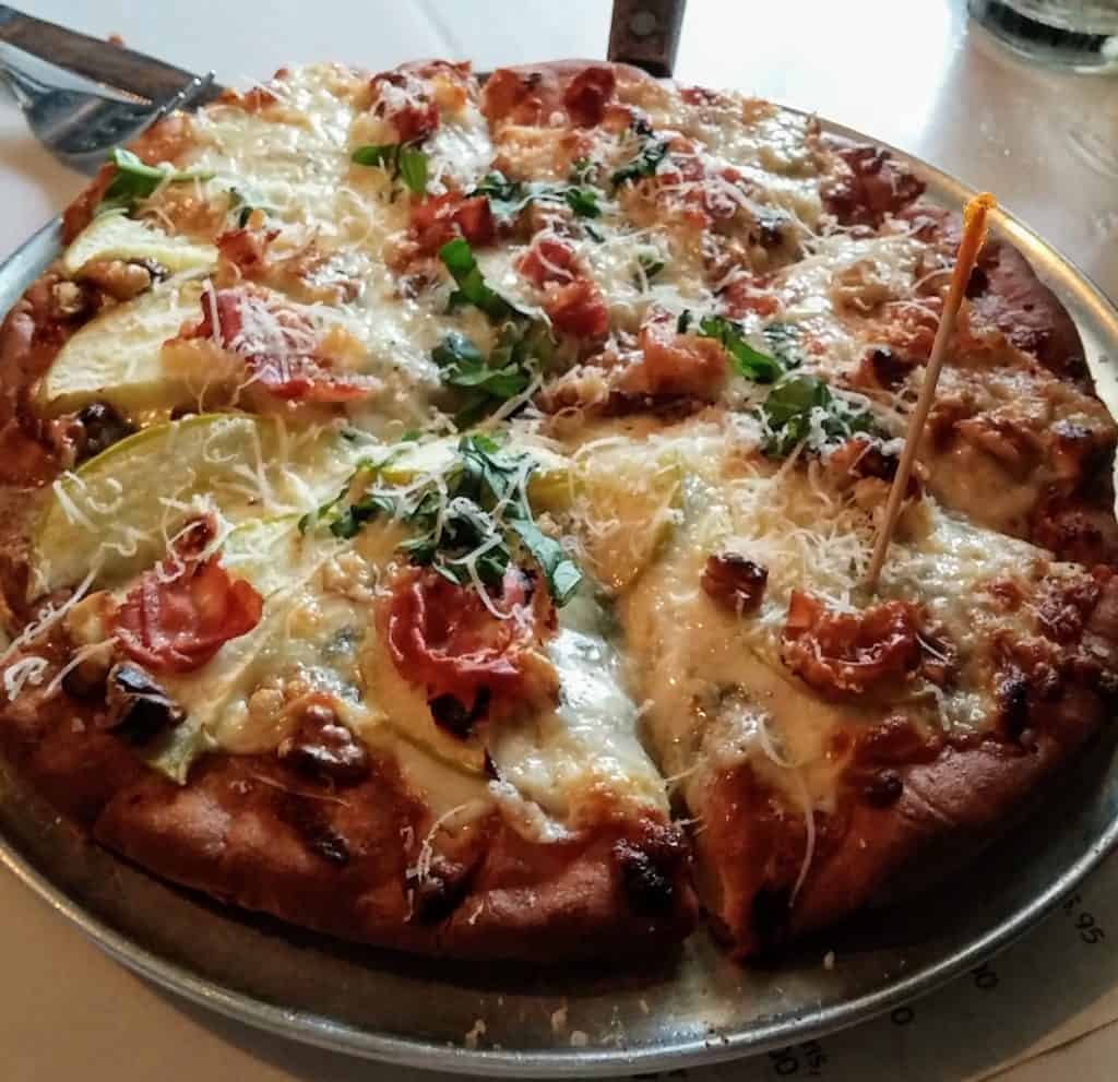 gluten free pizza at paisanos in albuquerque image