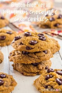 Gluten Free Pumpkin Chocolate Chip Cookies with perfect chewy edges! Coconut oil, pumpkin, sugar, gluten free flour, leavening, spices, and xanthan gum make these vegan pumpkin chocolate chip cookies too!