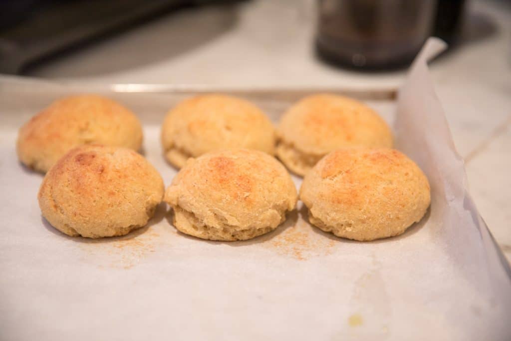 gluten free parmesan rolls on a baking sheet