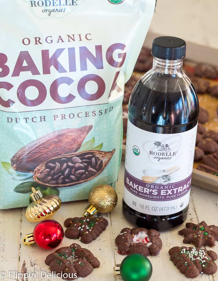 rodelle organic baking cocoa and rodelle bakers extract beside gluten free chocoalte spritz cookies and red, gold and green christmas ornaments