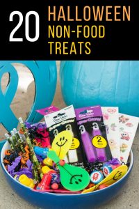 bowl filled with glow sticks, paddle balls, and other party favors to hand out to trick or treaters instead of halloween candy