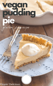 slice of vanilla vegan pudding pie on blue plate with full vegan pudding pie in the background with text "vegan pudding pie gluten free recipe"