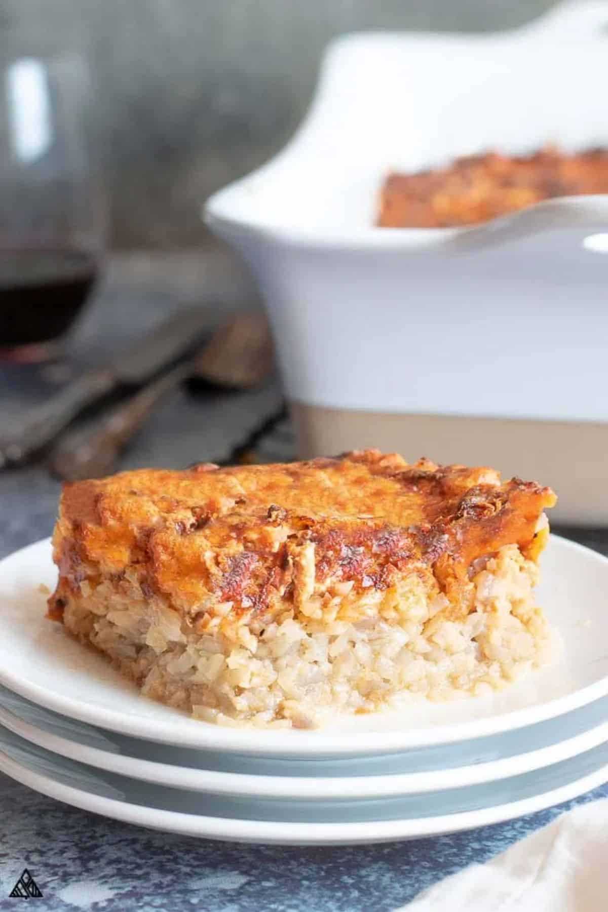 A piece of Ground Chicken on a white plate.