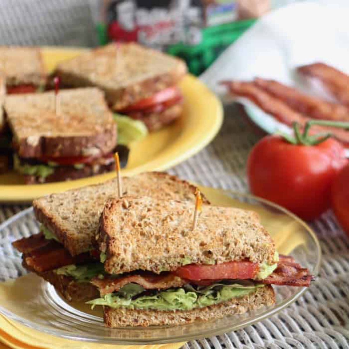 Gluten-Free Avocado sandwiches on a glass tray.