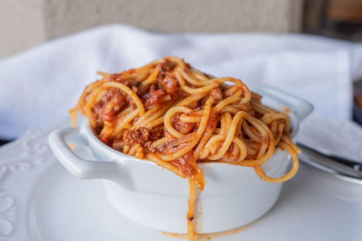 Instant Pot Spaghetti Bolognese in a white bowl.