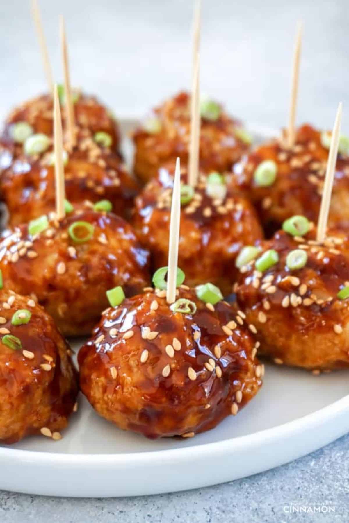 Asian Glazed Chicken Meatballs on a white tray.