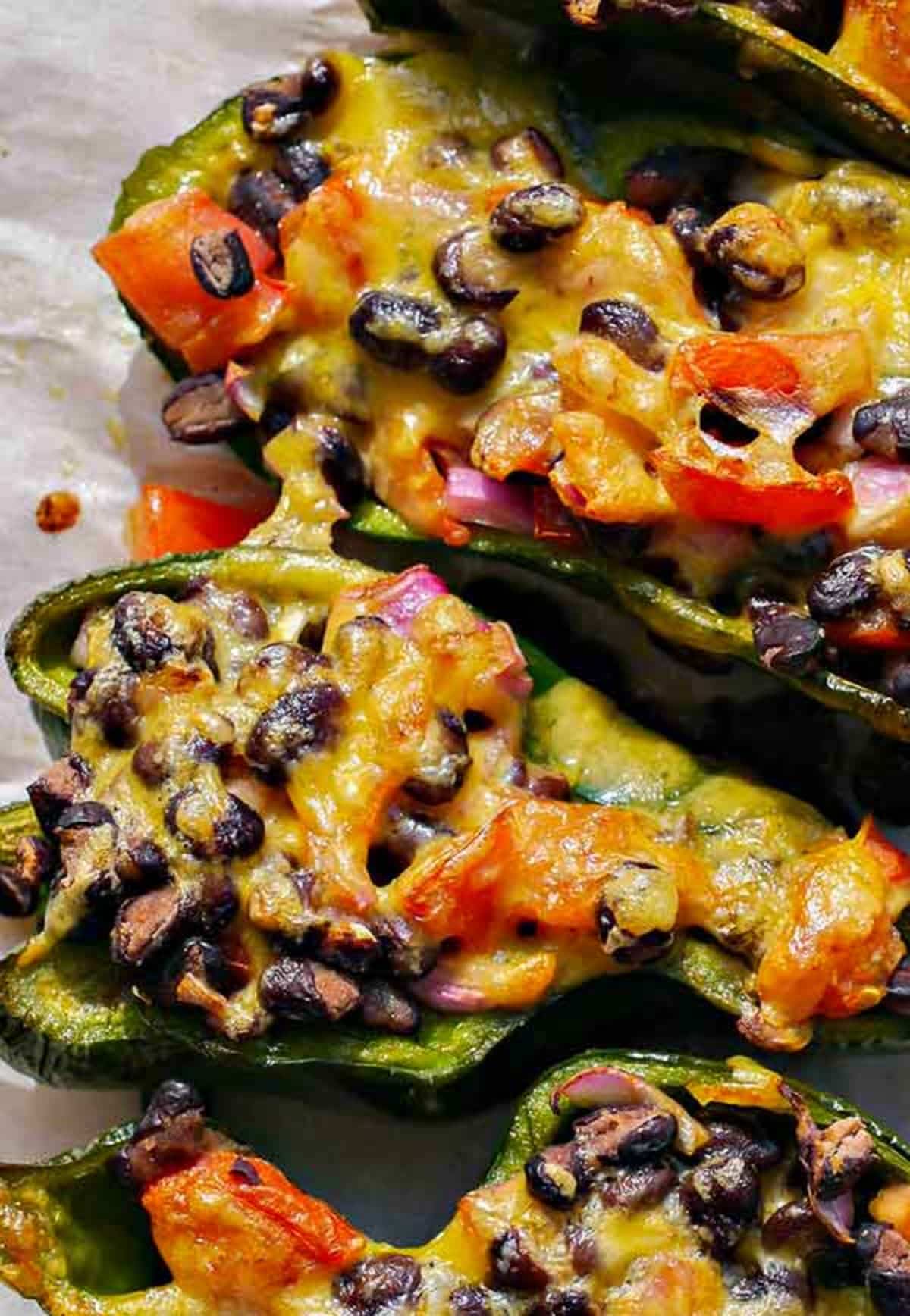 Roasted Stuffed Poblano Peppers on a parchment paper.
